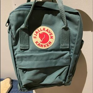 Green mini FJ backpack. Never used.